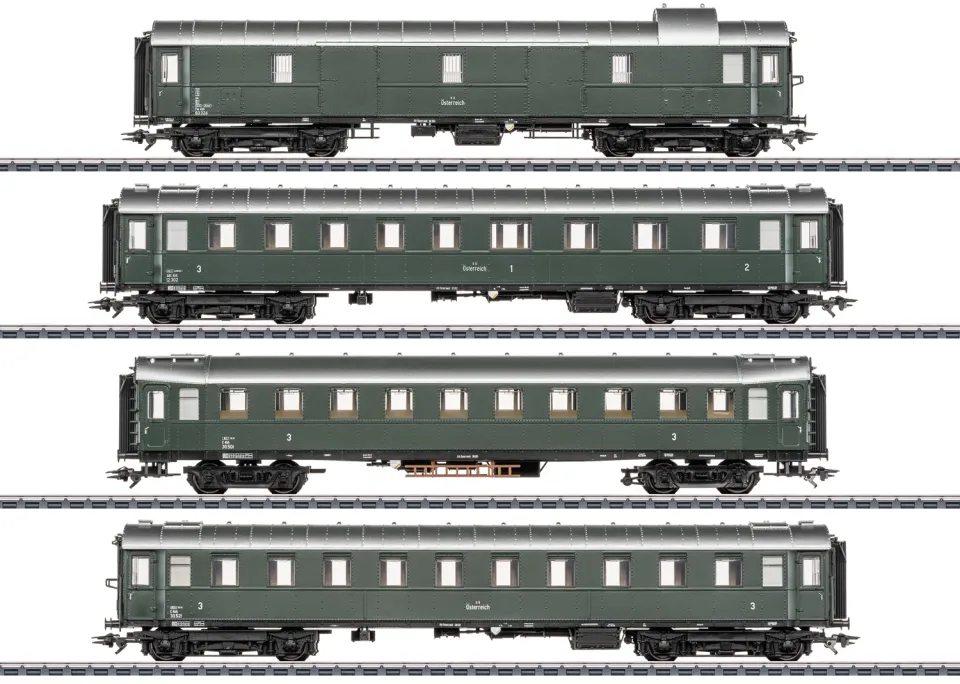 Der Märklin-Reisezugwagen-Set mit Gepäckwagen und drei grünen Personenwagen der ÖBB